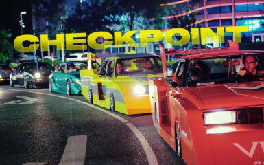 Cars lined up during a night street race event, with neon CHECKPOINT sign overhead.