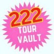 Pink starburst with '222 Tour Vault' text in bold red and white, signifying exclusive tour content or memorabilia.