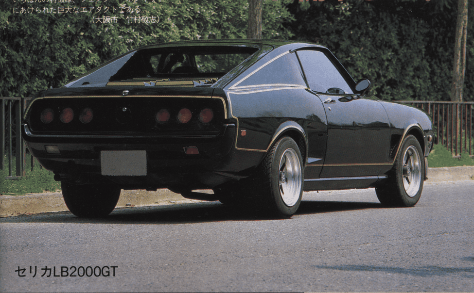Vintage black sports car parked on street, showcasing sleek design and retro style. Japan classic Celica LB2000GT.